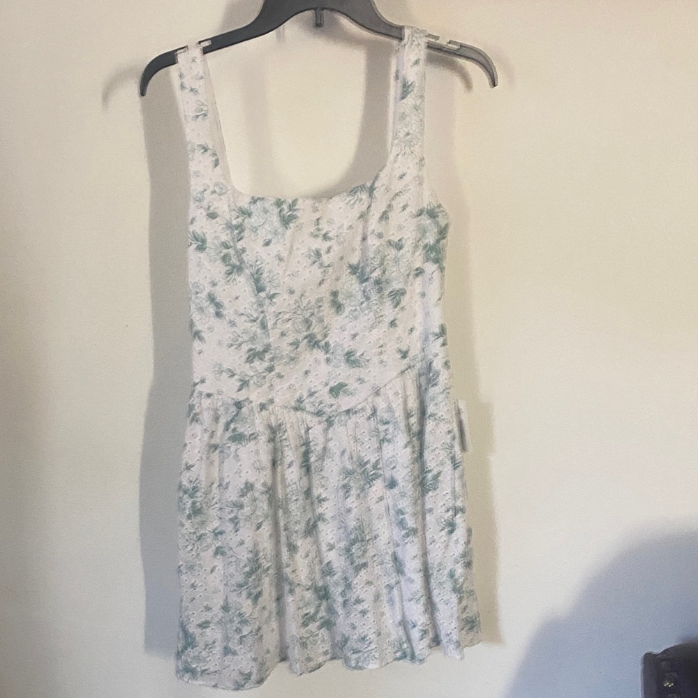 B. Smart White Dress with Sage Floral Print